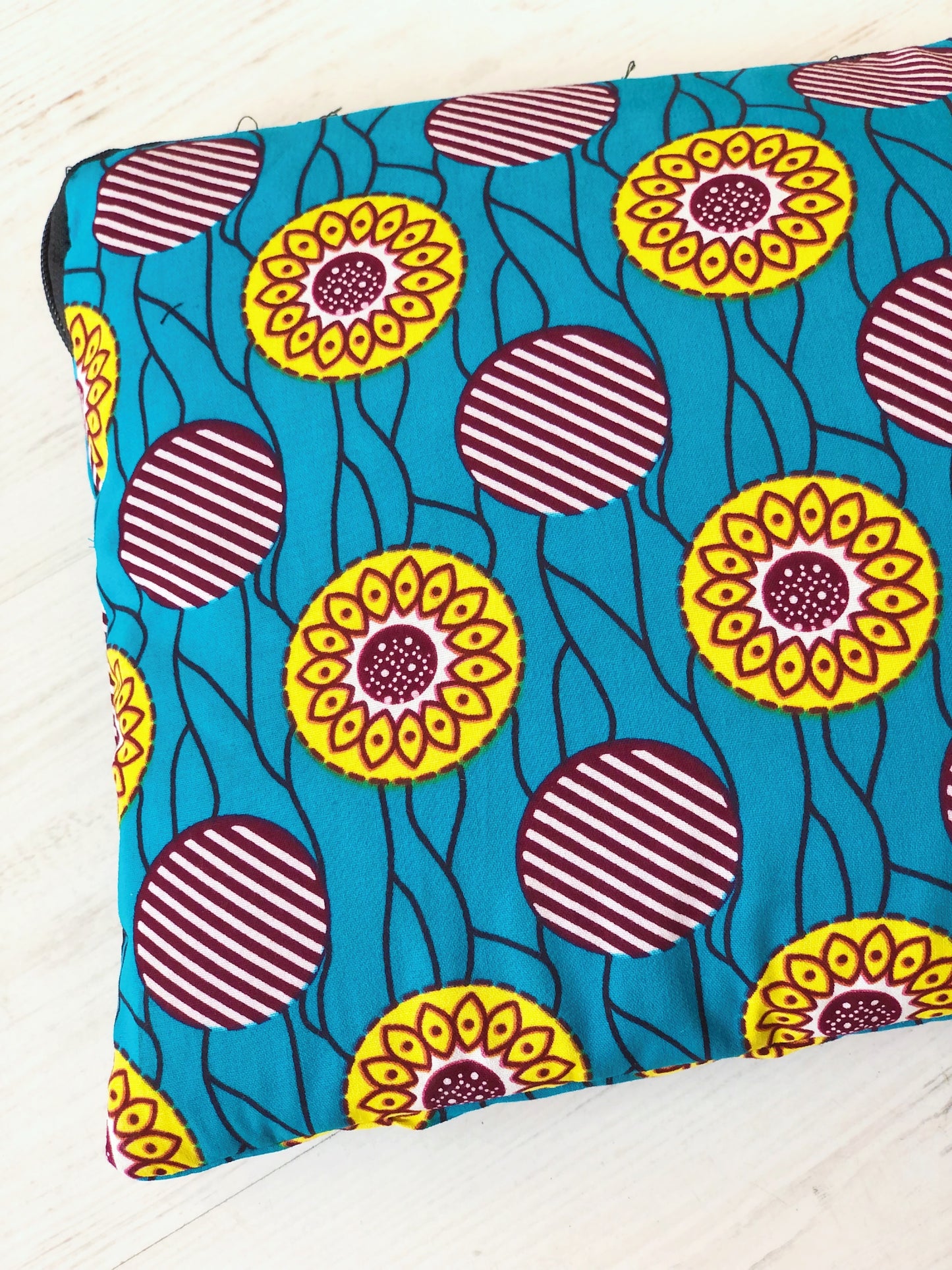 Case for 12" computer case with sunflowers details from West Africa