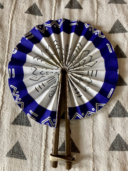 Fan- Collapses for easy storage, made from African wax fabric