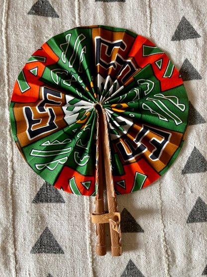 Fan- Collapses for easy storage, made from African wax fabric